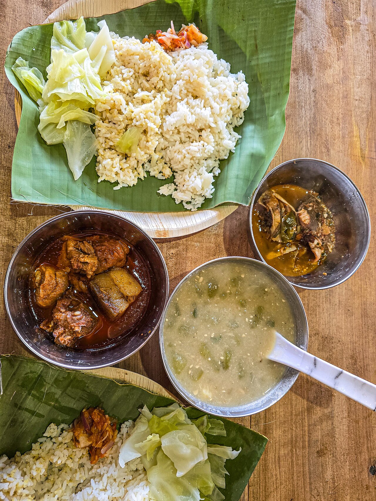 Naga food stalls at Hornbill Festival serving smoked pork and bamboo shoot